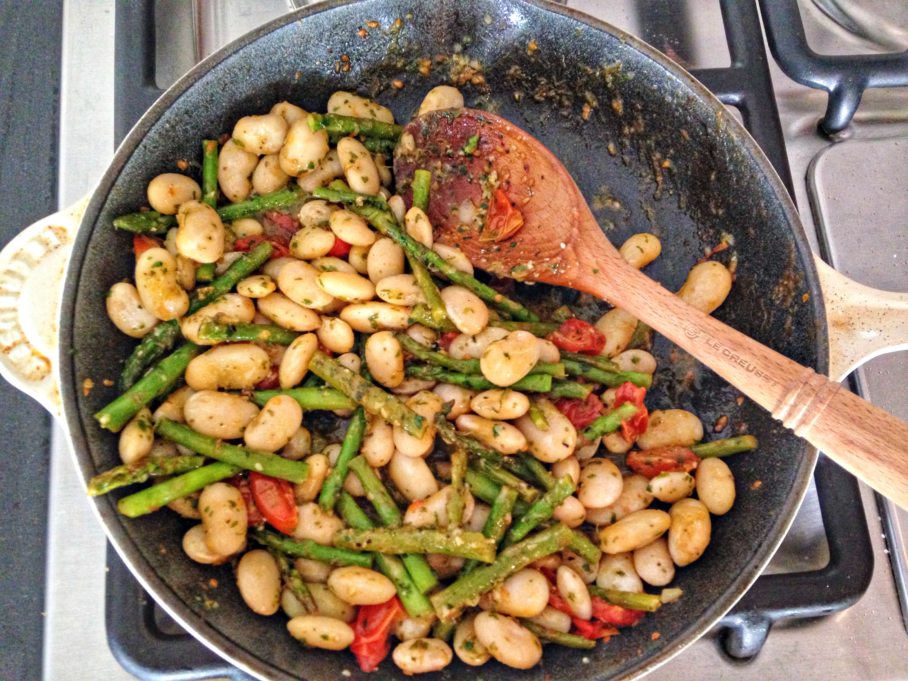 Asparagus and white beans with cilantro pesto -- the perfect weeknight dinner! @danielleomar #glutenfree #cleaneating