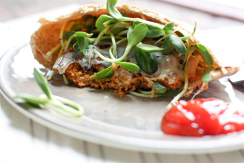 Freezer Friendly bean burgers on whole wheat pita! Perfect for a quick, healthy vegetarian dinner!